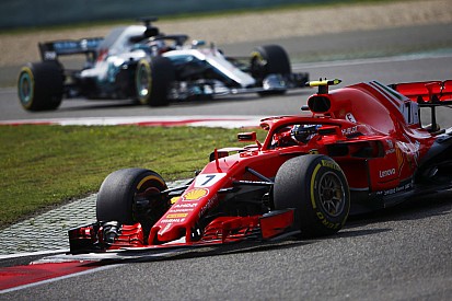 Räikkönen sur le podium après être revenu de loin