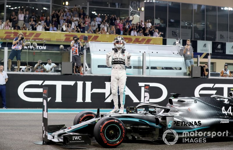 Lewis Hamilton, Mercedes AMG F1, celebrates on the grid after securing pole position