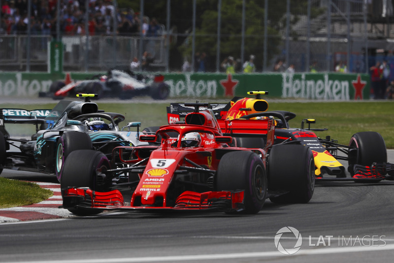 Sebastian Vettel, Ferrari SF71H, Valtteri Bottas, Mercedes AMG F1 W09 y Max Verstappen, Red