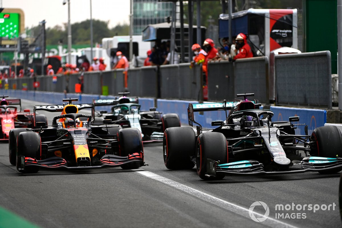 Lewis Hamilton, Mercedes W12, Max Verstappen, Red Bull Racing RB16B, in the pit lane