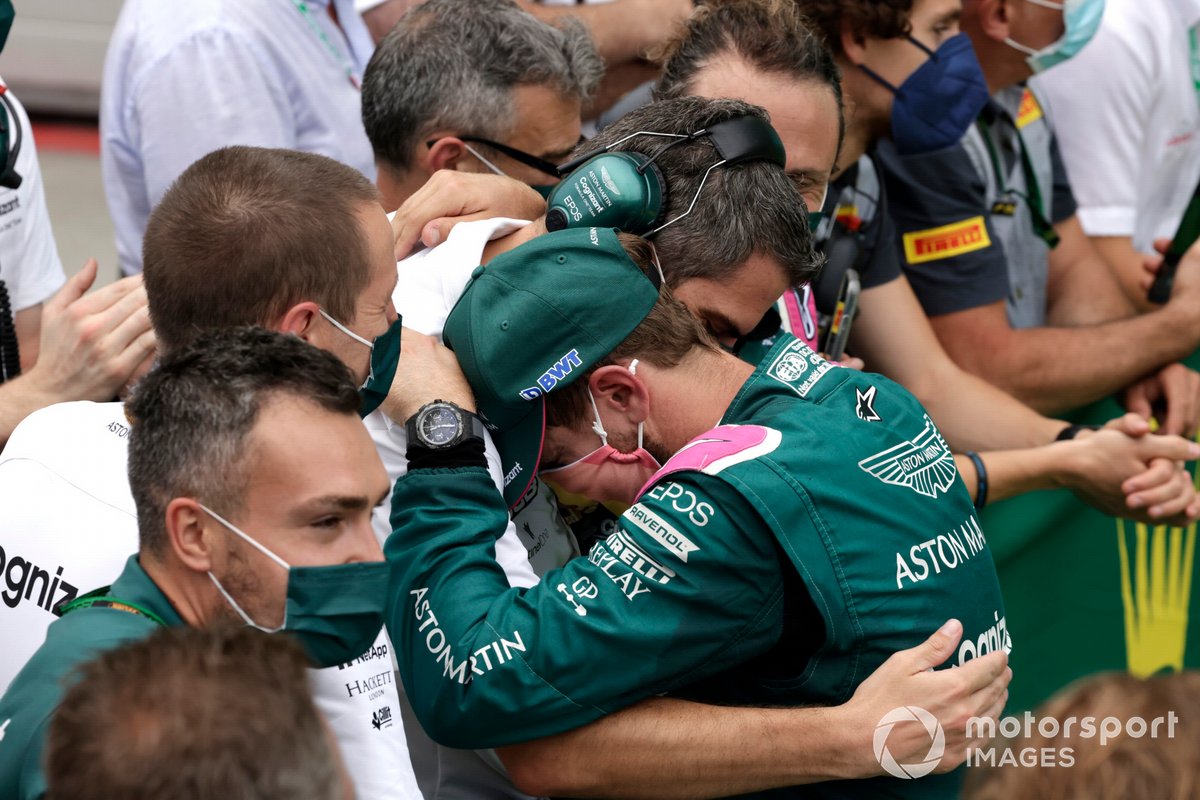 Sebastian Vettel, Aston Martin, 2nd position, celebrates with his team in Parc Ferme