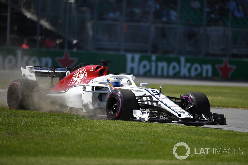 Marcus Ericsson, Sauber C37 rins wide across the grass