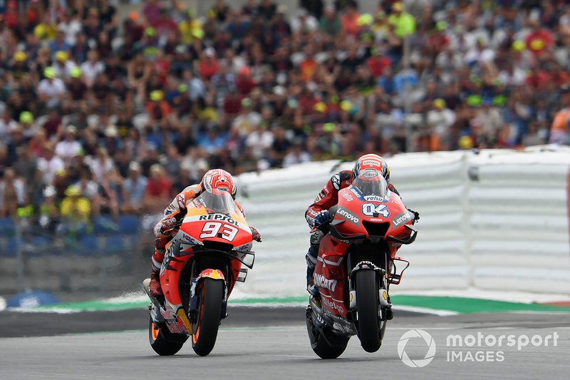 Pembalap Ducati Team, Andrea Dovizioso (depan), mencatat top speed tertinggi di MotoGP saat turun di GP Italia 2019. Tampak ia tengah berduel dengan Marc Marquez (Repsol Honda) di GP Austria 2019.