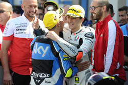 Winner Francesco Bagnaia, Aspar Team Mahindra and third place Andrea Migno, Sky Racing Team VR46