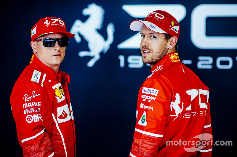 Гонщики Ferrari Кими Райкконен и Себастьян Феттель