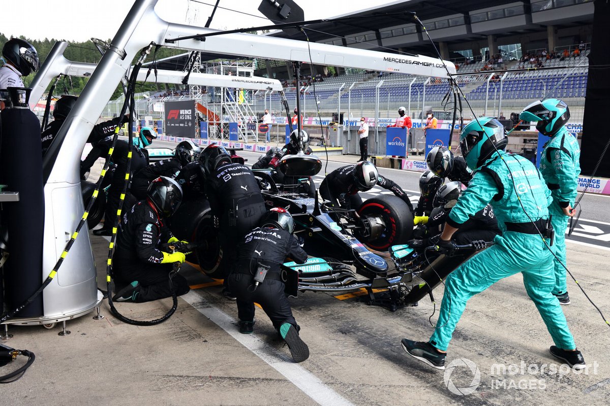 Lewis Hamilton, Mercedes W12, makes a pit stop