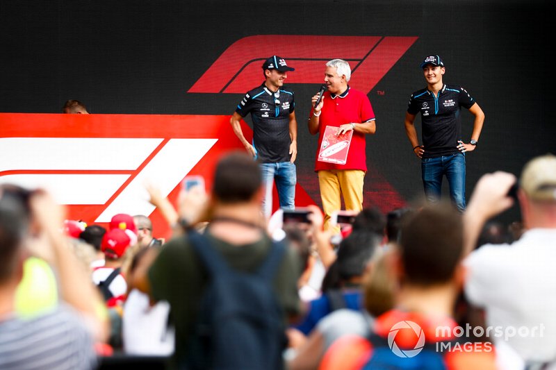 Robert Kubica, Williams Racing and George Russell, Williams Racing on stage in the fan zone