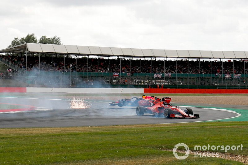 Sebastian Vettel, Ferrari locks up and runs into the back of Max Verstappen, Red Bull Racing RB15
