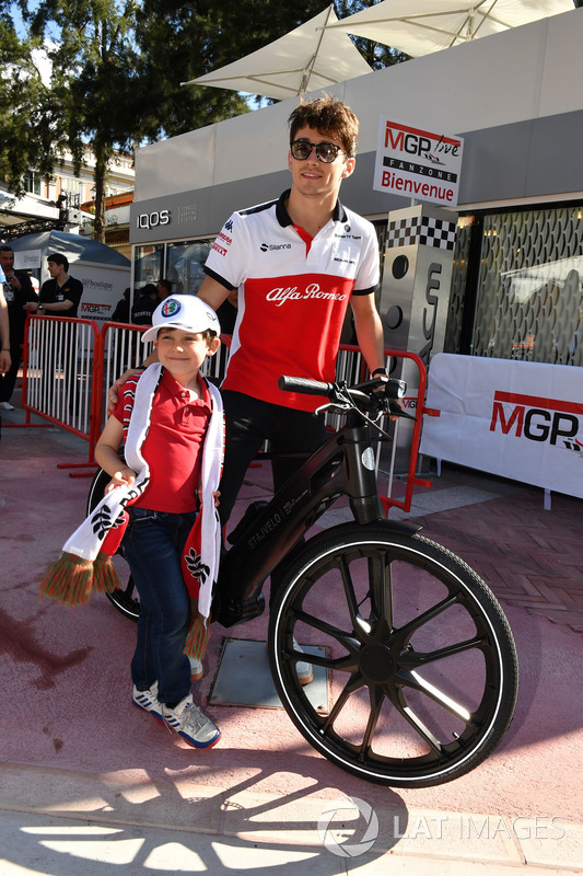 Charles Leclerc, Sauber on a bike and a young fan