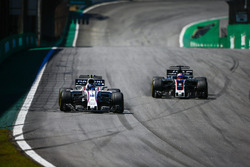 Lance Stroll, Williams FW40, Romain Grosjean, Haas F1 Team VF-17