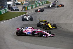 A sideways Sergio Perez, Force India VJM11, battles with Carlos Sainz Jr., Renault Sport F1 Team R.S. 18