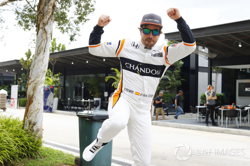 Fernando Alonso, McLaren, jumps through the frame