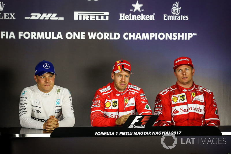 Conferenza stampa: il poleman Sebastian Vettel, Ferrari, il secondo qualificato Kimi Raikkonen, Ferrari, il terzo qualificato Valtteri Bottas, Mercedes-Benz F1