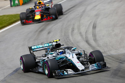Valtteri Bottas, Mercedes AMG F1 W09, leads Max Verstappen, Red Bull Racing RB14