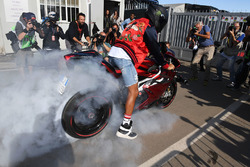 Lewis Hamilton, Mercedes AMG F1 does a burnout on his motorbike