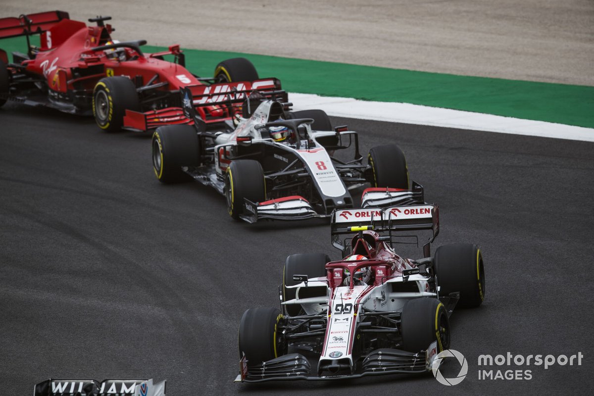 Antonio Giovinazzi, Alfa Romeo Racing C39, Romain Grosjean, Haas VF-20, and Sebastian Vettel, Ferrari SF1000