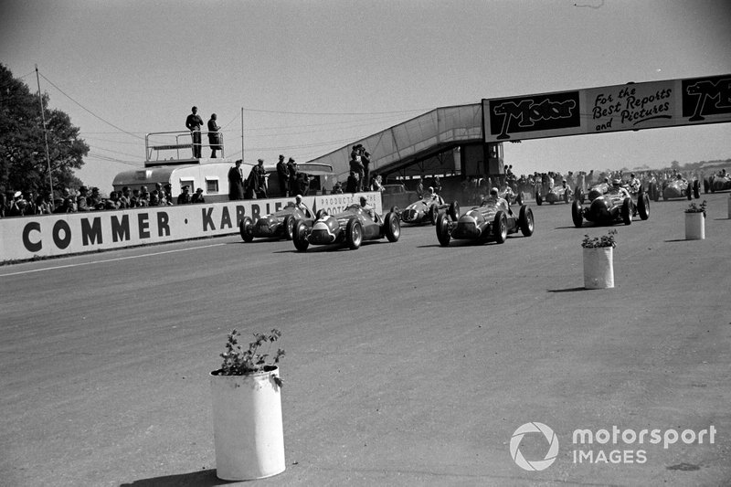 Luigi Fagioli, Alfa Romeo 158, leads Giuseppe Farina, Alfa Romeo 158, Juan Manuel Fangio, Alfa Romeo 158,