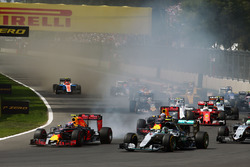 Max Verstappen, Red Bull Racing RB12 and Nico Rosberg, Mercedes AMG F1 W07 Hybrid at the start of the race