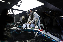 Lewis Hamilton, Mercedes AMG F1, climbs into his car