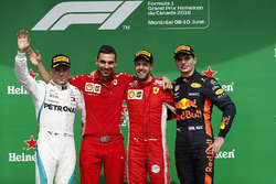 Sebastian Vettel, Ferrari, celebrates victory on the podium with Valtteri Bottas, Mercedes AMG F1 and Max Verstappen, Red Bull Racing