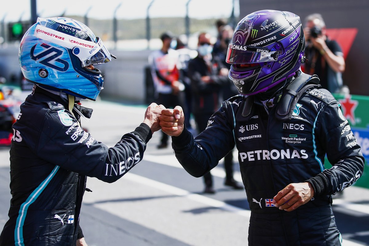 Pole man Valtteri Bottas, Mercedes, is congratulated by Lewis Hamilton, Mercedes, in Parc Ferme