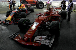 The damaged cars of Max Verstappen, Red Bull Racing RB13 and Kimi Raikkonen, Ferrari SF70H after cra