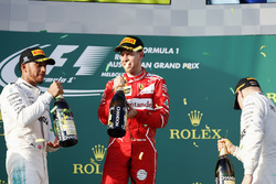Lewis Hamilton, Mercedes AMG, 2nd Position, Sebastian Vettel, Ferrari, 1st Position, and Valtteri Bottas, Mercedes AMG, 3rd Position, on the podium