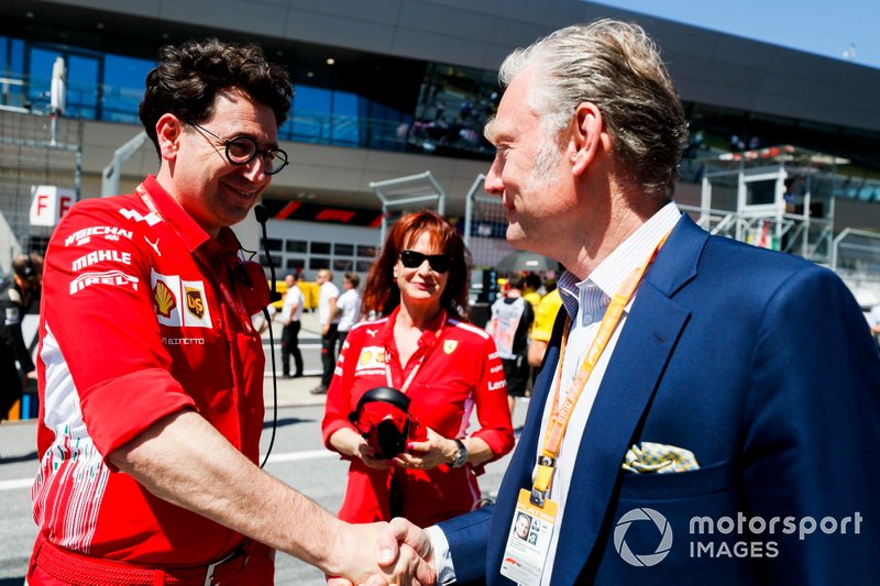 Mattia Binotto, Team Principal Ferrari and Sean Bratches, Managing Director of Commercial Operations, Formula One Group on the grid