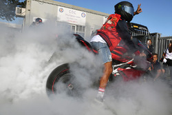 Lewis Hamilton, Mercedes AMG F1 does a burnout on his motorbike