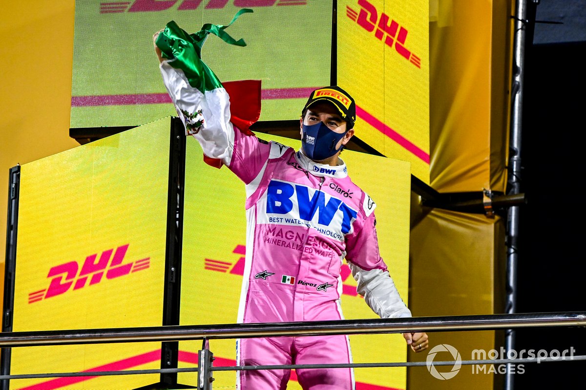 Sergio Perez, Racing Point, 1st position, on the podium with a Mexican flag