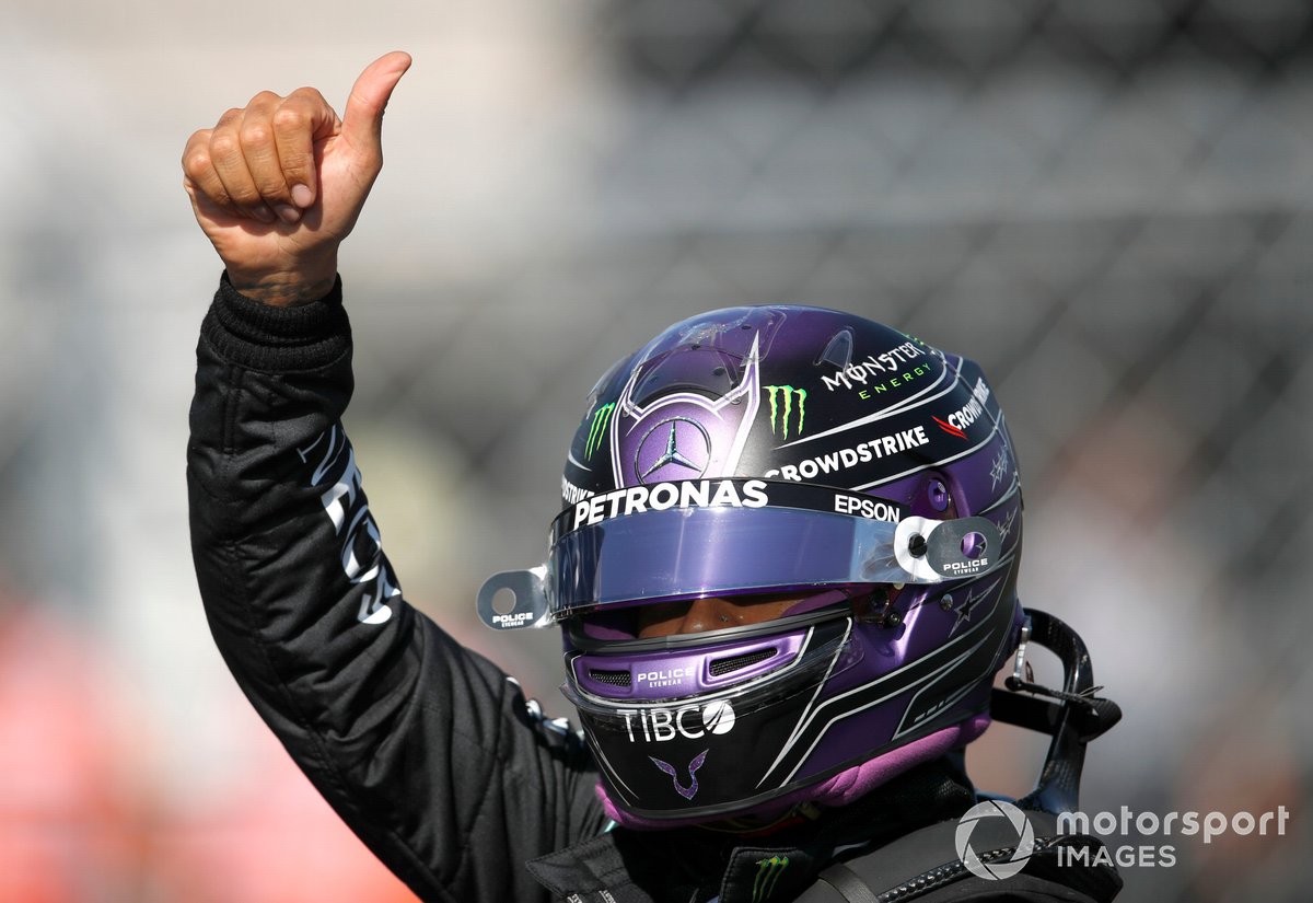 Pole man Lewis Hamilton, Mercedes, gives a thumbs up from Parc Ferme after Qualifying