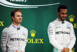 The podium (L to R): second placed Nico Rosberg, Mercedes AMG F1 with team mate and race winner Lewi