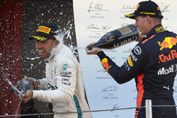 Lewis Hamilton, Mercedes AMG F1, 1st position, Max Verstappen, Red Bull Racing, 3rd position, celebrate with Champagne on the podium