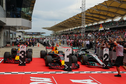 The cars of race winner Max Verstappen, Red Bull Racing RB13, Daniel Ricciardo, Red Bull Racing RB13 and Lewis Hamilton, Mercedes-Benz F1 W08 in parc ferme