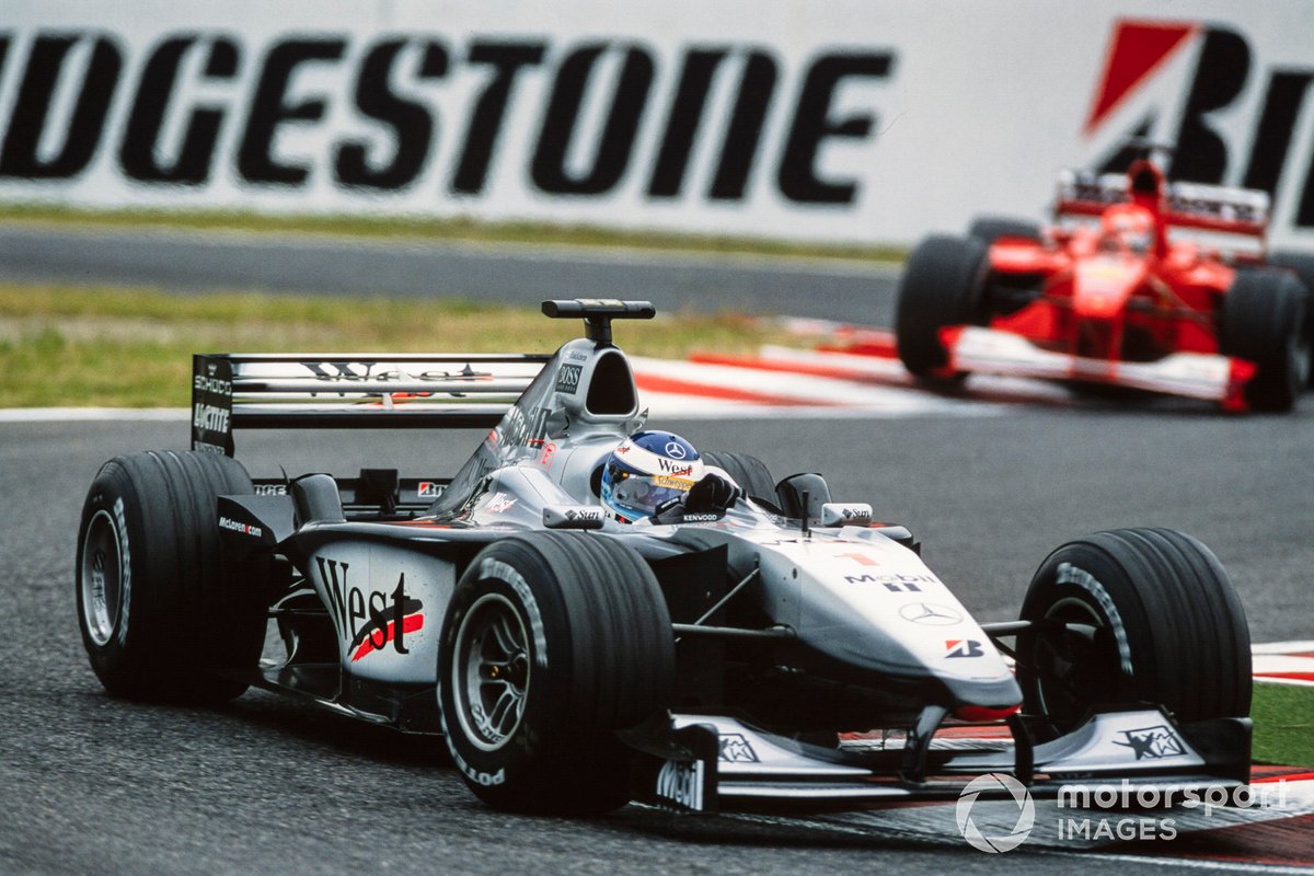 Mika Häkkinen, McLaren MP4-15 Mercedes, Michael Schumacher, Ferrari F1-2000