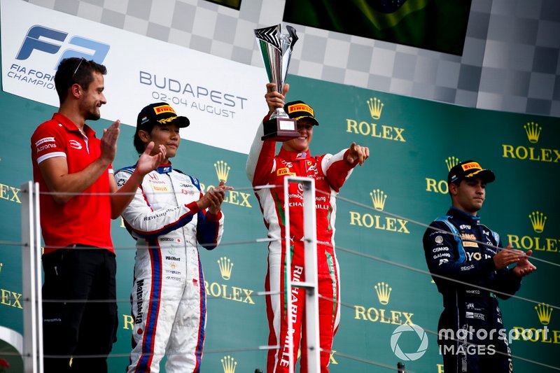 Nobuharu Matsushita, Carlin, Race winner Mick Schumacher, Prema Racing and Sergio Sette Camara, Dams celebrate on the podium