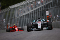 Lewis Hamilton, Mercedes AMG F1 W09, leads Kimi Raikkonen, Ferrari SF71H