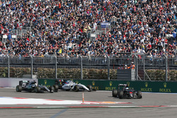 Fernando Alonso, McLaren MP4-31 leads Lewis Hamilton, Mercedes AMG F1 Team W07 and Valtteri Bottas,