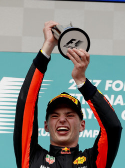 Max Verstappen, Red Bull Racing, race winner, lifts his trophy on the podium