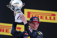 Formula 1 Photos - Race winner Max Verstappen, Red Bull Racing celebrates on the podium
