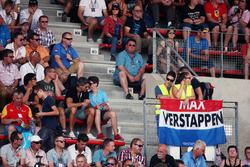 Fans and a flag for Max Verstappen, Red Bull Racing