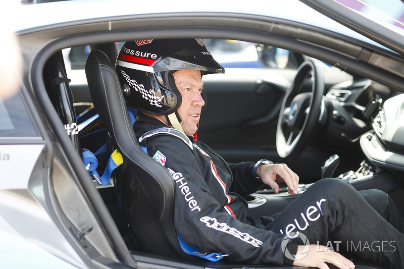 German Football Star Lothar Matthäus, in the BMW i8 Qualcomm safety car with Bruno Corriea