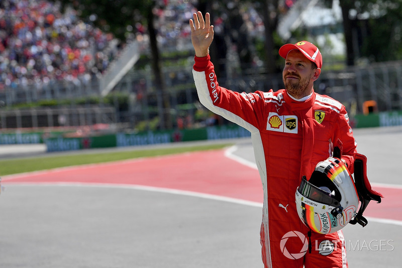 Pole sitter Sebastian Vettel, Ferrari celebrates in parc ferme