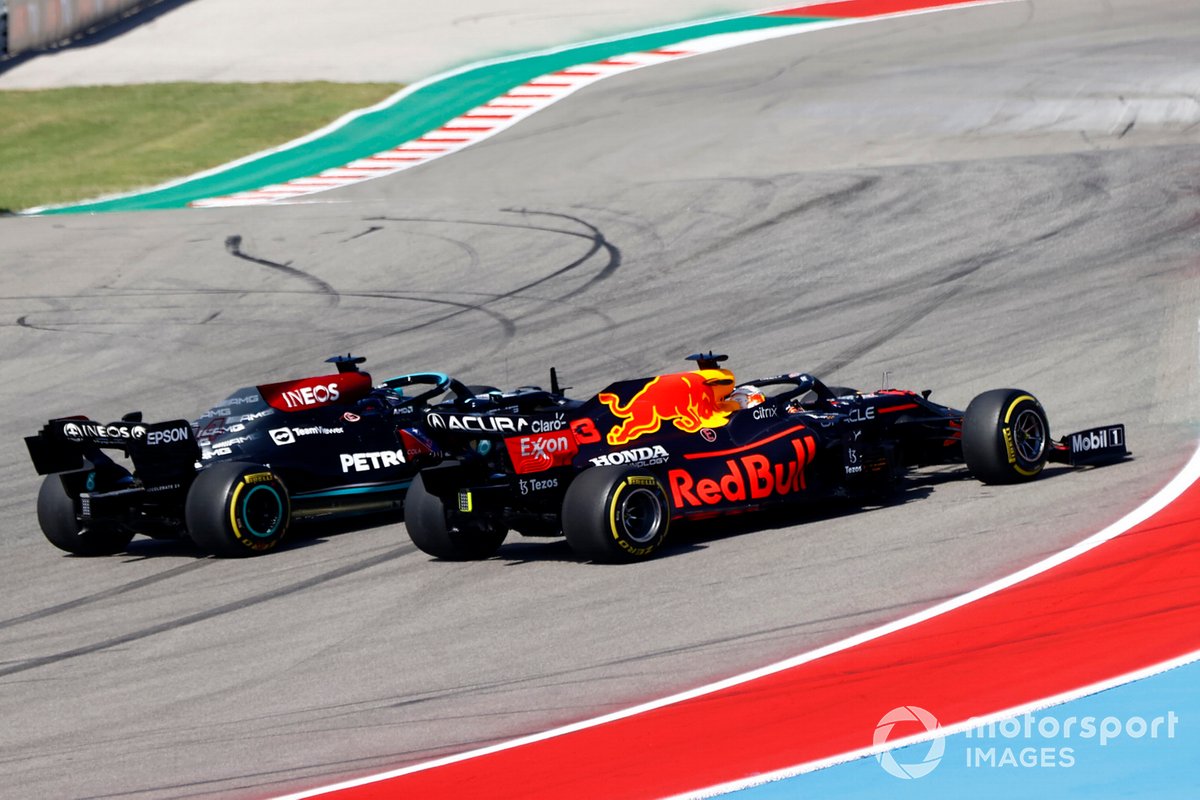 Max Verstappen, Red Bull Racing RB16B, battles with Lewis Hamilton, Mercedes W12