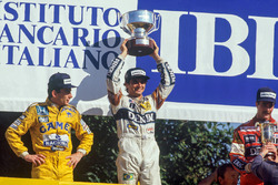 Podium: race winner Nelson Piquet, Williams, second place Ayrton Senna, Team Lotus, third place Nige