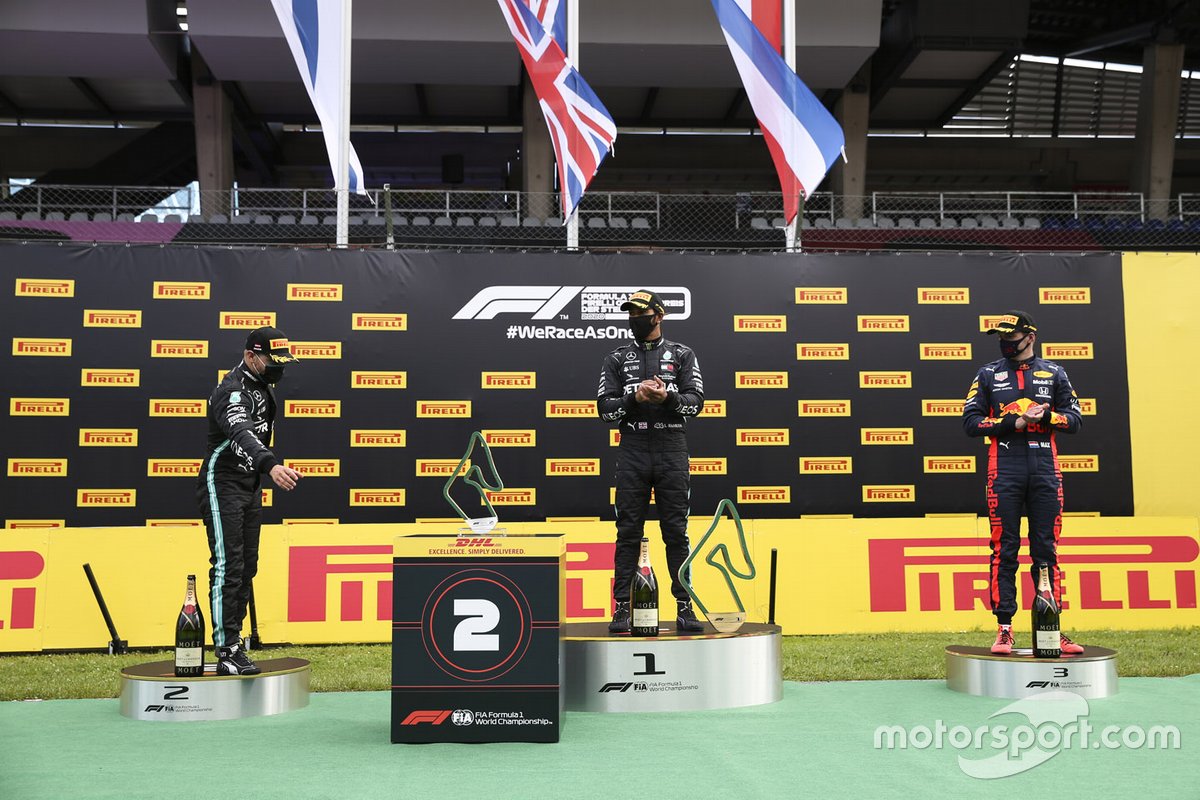 Valtteri Bottas, Mercedes-AMG Petronas F1 celebrates on the podium with the trophy with Race winner Lewis Hamilton, Mercedes-AMG Petronas F1 anDrivers Max Verstappen, Red Bull Racing