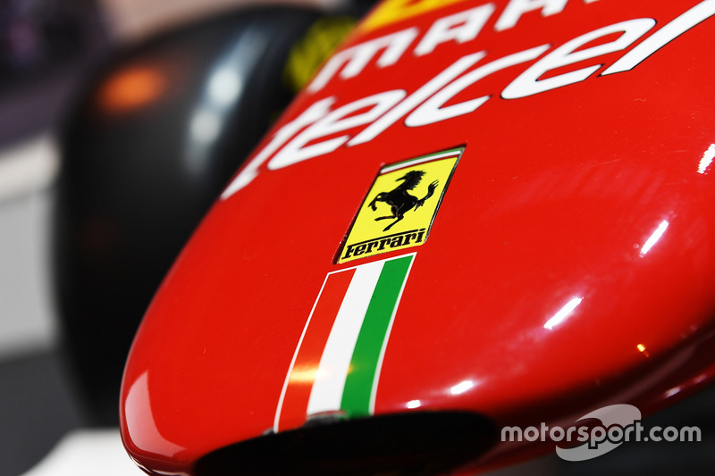 A Ferrari logo on a car in the F1 Racing display