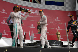 Race winner Lewis Hamilton, Mercedes AMG F1 celebrates on the podium with team mate Nico Rosberg, Me