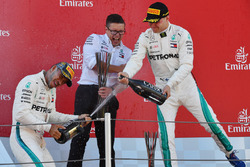 Lewis Hamilton, Mercedes-AMG F1, Valtteri Bottas, Mercedes-AMG F1 and Peter Bonnington, Mercedes AMG F1 Race Engineer celebrate on the podium with the champagne