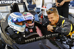 Mika Hakkinen takes Sergio Perez, Force India, forn a ride